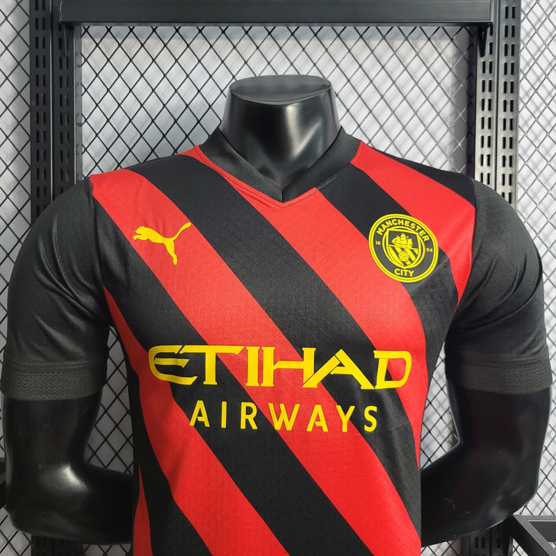 CAMISA DO MANCHESTER CITY 22/23 VERMELHO E PRETO VERSÃO JOGADOR